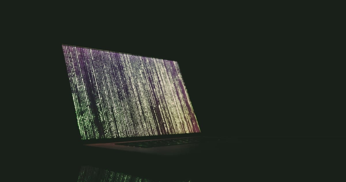 Close-up of software code on a monitor, illustrating Content Moderation AI Tools