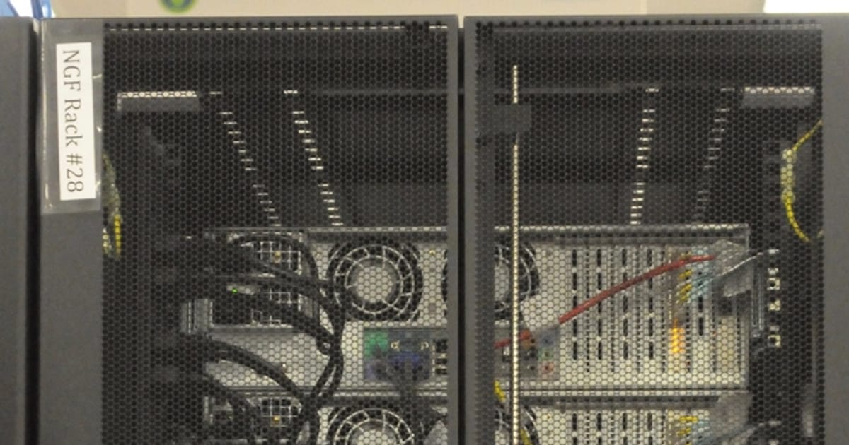 Server racks with networking hardware in a data center, illustrating LLM Alignment